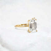 flameleaf-embrace-emerald-spark-moissanite-engagement-ring-3-ct-yellow-gold-gemfora-2
